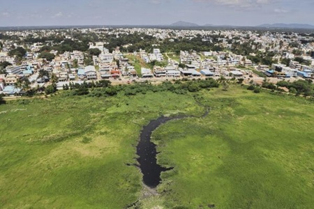Bengaluru lake development and restoration project improving urban water bodies and parks.