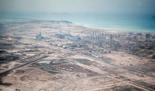 Smoke rising from Saudi Aramco Ras Tanura oil refinery after Iranian drone debris strike, Middle East energy hub