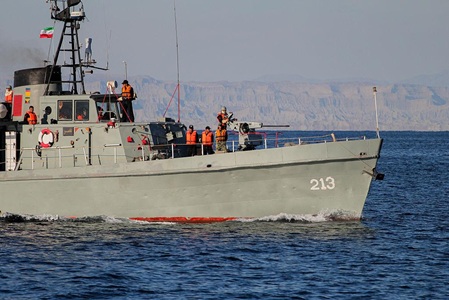 Iranian warship at sea after reports of US submarine attack sparking international tensions