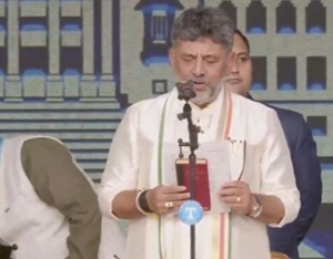 DK Shivakumar taking oath as Karnataka Chief Minister during the swearing-in ceremony in Bengaluru
